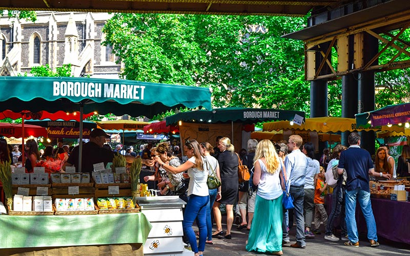 People walking through Borough Market