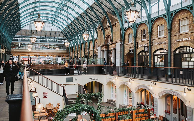 Tourist exploring Covent Garden in London