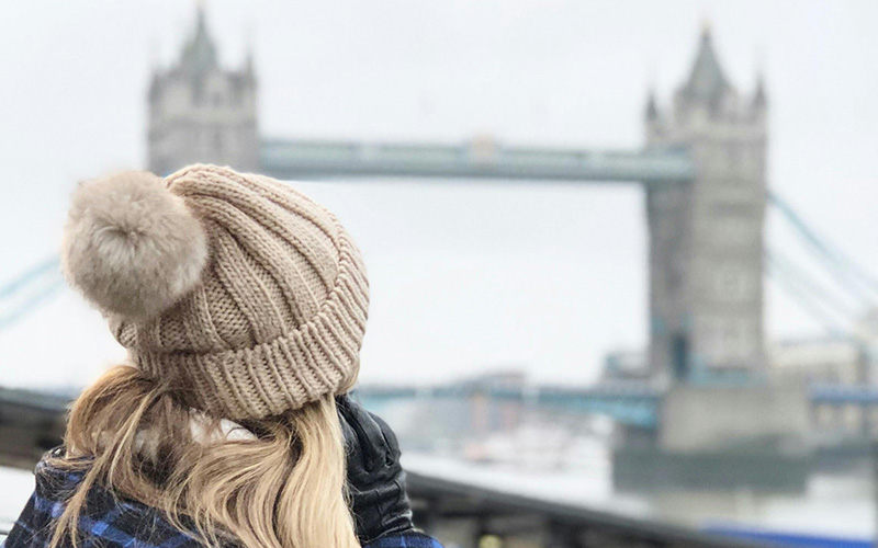  A girl standing and gazing at London Bridge