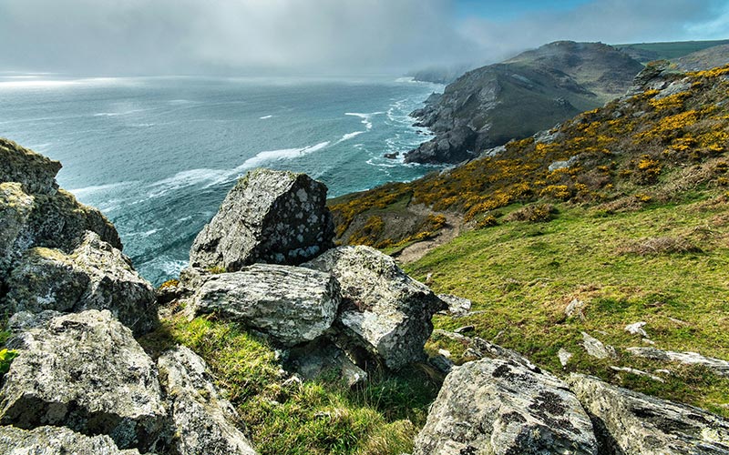 Scenic view of Cornwall, UK, in May with lush greenery and coastal landscapes